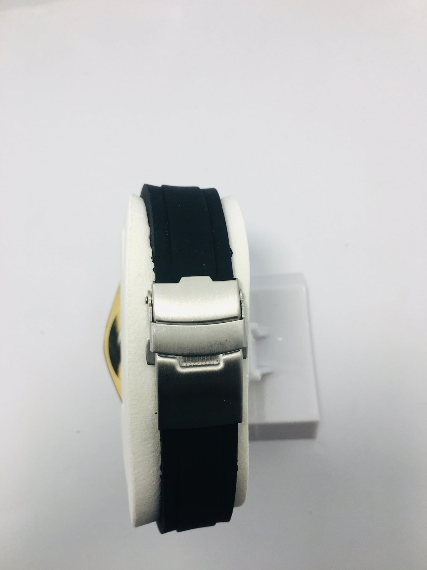 Mitina Movement diver-style watch with a black dial, gold-colored accents, a rotating bezel, and a date window. Rubber strap black